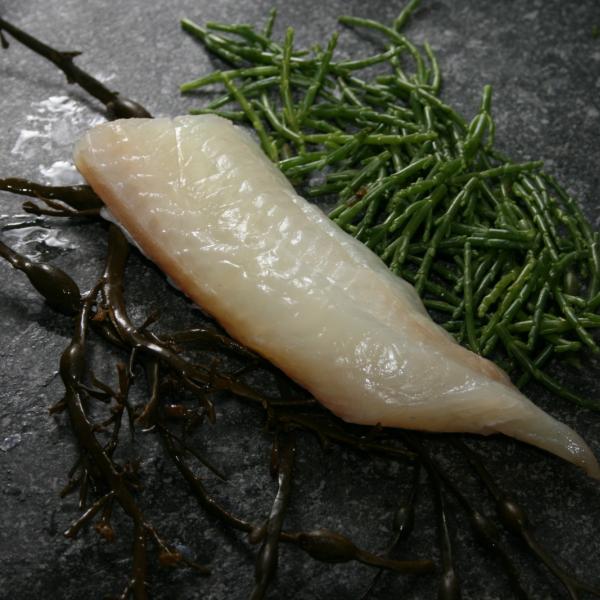 Undyed natural smoked haddock portion